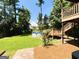 Backyard with an above-ground pool, deck, and landscaping at 5445 Maltdie, Sugar Hill, GA 30518