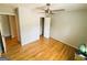 Bedroom featuring a ceiling fan and hardwood floors at 5445 Maltdie, Sugar Hill, GA 30518