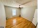 Bedroom with a ceiling fan and hardwood floors at 5445 Maltdie, Sugar Hill, GA 30518