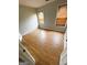 Spacious bedroom features hardwood flooring and natural light from wood-slatted windows at 5445 Maltdie, Sugar Hill, GA 30518