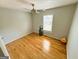 Bedroom featuring a ceiling fan and hardwood floors at 5445 Maltdie, Sugar Hill, GA 30518