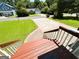 View of the driveway and the front yards of two homes at 5445 Maltdie, Sugar Hill, GA 30518