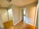 Hallway area with two entryways and wood-look floors at 5445 Maltdie, Sugar Hill, GA 30518