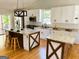 Stunning kitchen with granite countertops, stainless steel appliances, and a stylish kitchen island at 5445 Maltdie, Sugar Hill, GA 30518