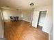 View of a living room area featuring wood-look flooring and a closet at 5445 Maltdie, Sugar Hill, GA 30518
