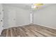 Bedroom with ceiling fan and neutral walls has a closet at 147 Pine St, Covington, GA 30014