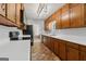 Well-maintained kitchen with stainless steel appliances and convenient layout at 147 Pine St, Covington, GA 30014