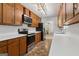 Charming kitchen equipped with modern appliances and ample counter space at 147 Pine St, Covington, GA 30014