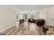 Comfortable living room with hardwood floors and access to outdoor patio at 147 Pine St, Covington, GA 30014