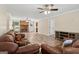 Inviting living room featuring comfortable seating, a fireplace, and bright, open layout at 147 Pine St, Covington, GA 30014