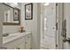 Well-lit bathroom featuring a vanity with white countertops at 100 Old Plantation Way, Fayetteville, GA 30214
