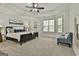 Serene bedroom with a tray ceiling, large windows, and a comfortable king-sized bed at 100 Old Plantation Way, Fayetteville, GA 30214