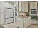 Well-appointed kitchen featuring modern appliances, ample cabinet space, and a convenient layout for cooking at 100 Old Plantation Way, Fayetteville, GA 30214