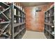 This wine cellar is a connoisseur's dream with its custom racking and climate control features at 100 Old Plantation Way, Fayetteville, GA 30214