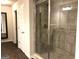 Bathroom featuring a glass-enclosed tiled shower at 85 Crabapple Ridge Dr, Oxford, GA 30054