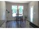 Bright eat-in kitchen nook with hardwood floors and natural light at 85 Crabapple Ridge Dr, Oxford, GA 30054