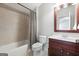 Clean and functional bathroom featuring shower-tub combo, with vanity and neutral color palette at 48 Star Spangled Ln, Peachtree City, GA 30269