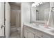 Bright bathroom featuring white vanity and tub-shower combination at 48 Star Spangled Ln, Peachtree City, GA 30269