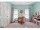 Brightly painted bedroom featuring large windows and light-colored carpet at 48 Star Spangled Ln, Peachtree City, GA 30269
