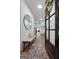 Bright entryway with hardwood floors, stylish decor, and an inviting view into the home at 48 Star Spangled Ln, Peachtree City, GA 30269