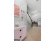 Hallway featuring a staircase and neutral-colored decor at 48 Star Spangled Ln, Peachtree City, GA 30269