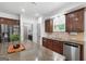 Kitchen features stainless steel appliances, granite countertops, and a large center island at 48 Star Spangled Ln, Peachtree City, GA 30269