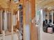 Unfinished basement with exposed beams, shelving and storage space at 2110 Mcgarity Rd, Mcdonough, GA 30252