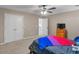This cozy bedroom includes closet space and carpet flooring at 2110 Mcgarity Rd, Mcdonough, GA 30252