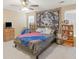 A cozy bedroom featuring a tapestry on the wall and carpet flooring at 2110 Mcgarity Rd, Mcdonough, GA 30252