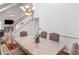 Dining room features stylish chandelier lighting, hardwood floors, and seating for six at 2110 Mcgarity Rd, Mcdonough, GA 30252