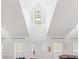 Bright foyer features vaulted ceilings, chandelier, and natural light at 2110 Mcgarity Rd, Mcdonough, GA 30252