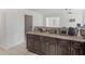 Spacious kitchen with dark cabinetry, offering ample counter space and storage solutions at 2110 Mcgarity Rd, Mcdonough, GA 30252