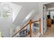 Bright staircase with a clear view to the living room and front door entrance at 2110 Mcgarity Rd, Mcdonough, GA 30252