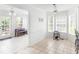 Bright sunroom with tile floors, windows all around, and open layout at 2110 Mcgarity Rd, Mcdonough, GA 30252