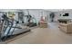 Finished basement offering recreational space including exercise equipment and a pool table at 1103 Wilder Ct, Mcdonough, GA 30252