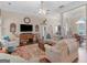 Bright living room featuring hardwood floors, ample seating, and an open layout providing an ideal space for relaxation at 1103 Wilder Ct, Mcdonough, GA 30252