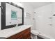 Updated bathroom showcasing a sink, mirror, and walk-in shower at 954 Camp Creek Sw Dr, Lilburn, GA 30047