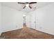 This bedroom has neutral walls, carpet and a ceiling fan at 954 Camp Creek Sw Dr, Lilburn, GA 30047