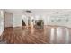 Spacious living room with wood floors, stairs to the second level, and an open design at 954 Camp Creek Sw Dr, Lilburn, GA 30047