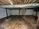 Unfinished basement with exposed pipes, cement block wall and support beams at 3144 Clemons Rd, Stockbridge, GA 30281