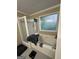 Bathroom features a soaking tub with a privacy window, and a glass-enclosed shower at 375 Big Game Way, Loganville, GA 30052