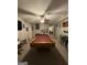 Entertaining game room with a pool table, television, and unique decor creating a fun, recreational space at 375 Big Game Way, Loganville, GA 30052