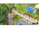 Overhead shot showcasing the community's layout, including the pool and tennis court at 32 Ivy Ne Pkwy, Atlanta, GA 30342