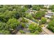 An aerial view showcases residences with beautiful green spaces, swimming pool and parking at 32 Ivy Ne Pkwy, Atlanta, GA 30342