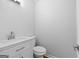 Bathroom features a modern vanity with white countertop and cabinetry at 32 Ivy Ne Pkwy, Atlanta, GA 30342
