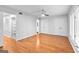 Spacious bedroom with hardwood floors, closet, and ensuite bathroom access at 32 Ivy Ne Pkwy, Atlanta, GA 30342