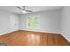 Empty bedroom with hardwood floors and natural light at 32 Ivy Ne Pkwy, Atlanta, GA 30342