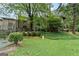 Exterior view of the property highlighting landscaping and community features at 32 Ivy Ne Pkwy, Atlanta, GA 30342