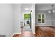 Bright foyer with gleaming hardwood floors, showcasing an inviting entrance and natural light at 32 Ivy Ne Pkwy, Atlanta, GA 30342