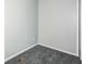 Compact bedroom featuring gray walls and carpets for a muted space at 6770 Burkhead Dr, Union City, GA 30291